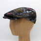 The Graffiti Camo Flat Cap by Hologramme Paris