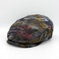 The Graffiti Camo Flat Cap by Hologramme Paris