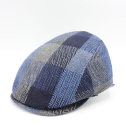 The "FunkyBrims Blue Tweed" Pub Cap by Hologramme Paris