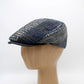 The "Tailored Patchwork" Flat Cap by Hologramme Paris