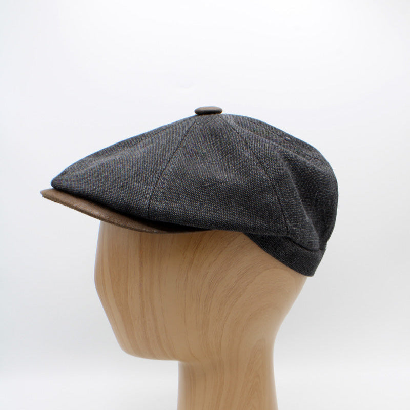 The "RainRunner" - Black Newsboy Cap by Hologramme Paris