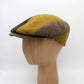 The "Bee Sting First Class" Flat Cap by Hologramme Paris