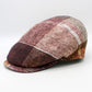 The "Big Plaid - Reds” Flat Cap by Hologramme Paris