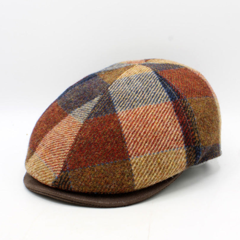 Plaid patterned cap on a white background