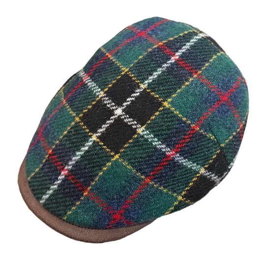 Plaid Harris tweed flat cap with green, red, and black pattern at FunkyBrims.