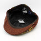 The "Tartan Patch: Flame" Newsboy Cap by Hologramme Paris