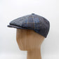 The "TweedPatch Shelby - Indigo" Newsboy Cap by Hologramme Paris