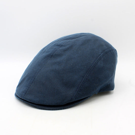 Blue flat cap on a white background