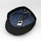 The All-Weather Newsboy – Midnight Black Wax Cotton by Hologramme Paris