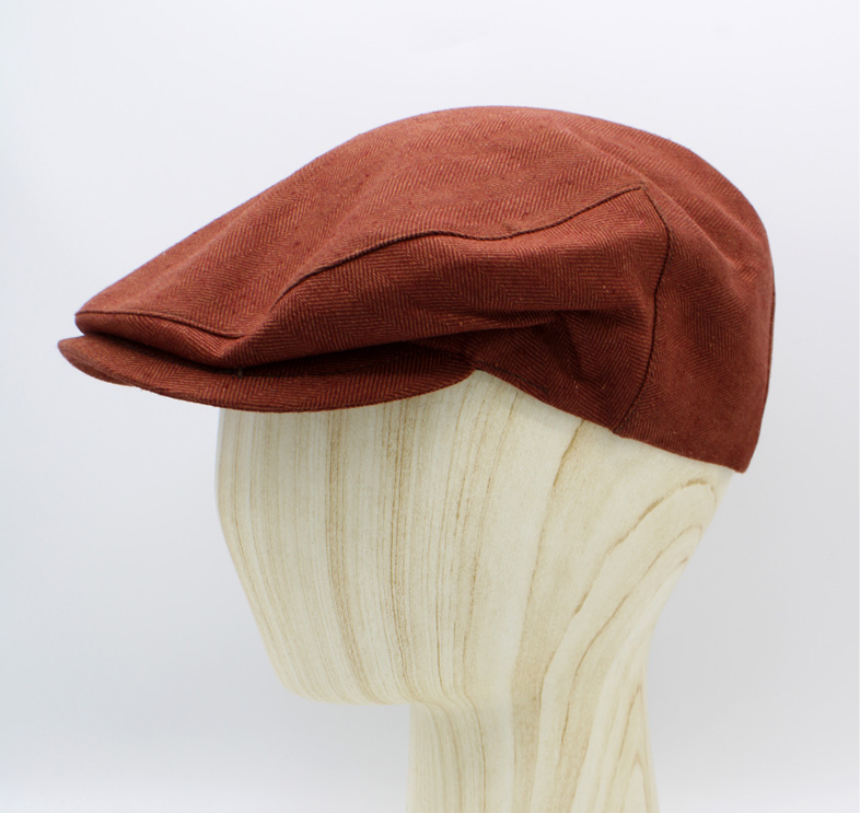 The Burgundy Herringbone Linen Flat Cap by Hologramme Paris