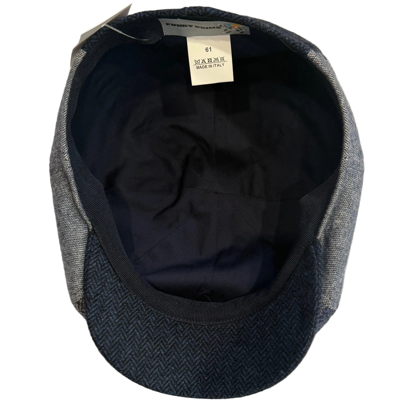 The Chelsea Patch Newsboy by FunkyBrims.  Blue plaids, tweeds, and herringbone cap.